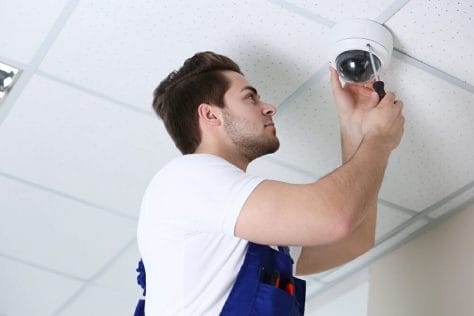 Professional CCTV technician working- SCSCCTV